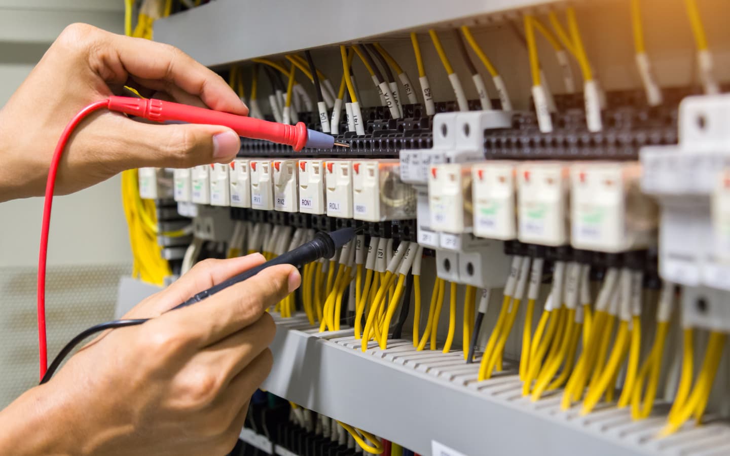 Hands doing electrical works